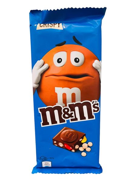 Шоколад молочний з хрусткими кульками та кольоровим драже Емемдемс M&M's Crispy  1610 фото